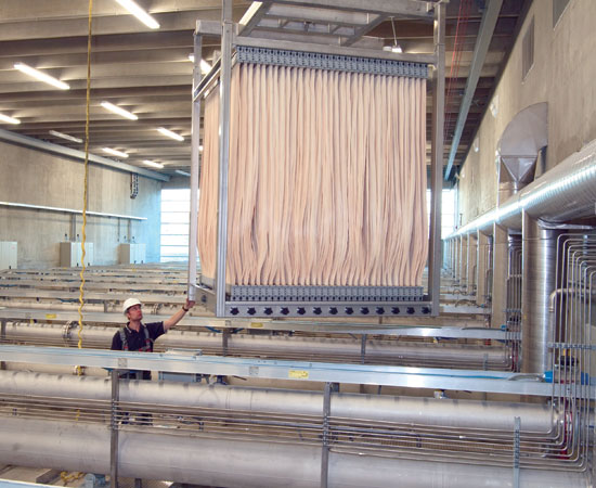 crane lowering cassette into place