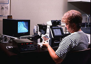 Figure 14-14. A reflective optical microscope is used to compare the microstructures of metal specimens.