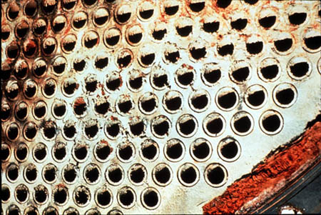 Figure 25-6. Calcium and iron phosphate fouling due to low water velocity.