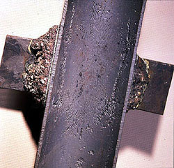 Figure 14-5. Stress at a weld attachment caused localized corrosion.